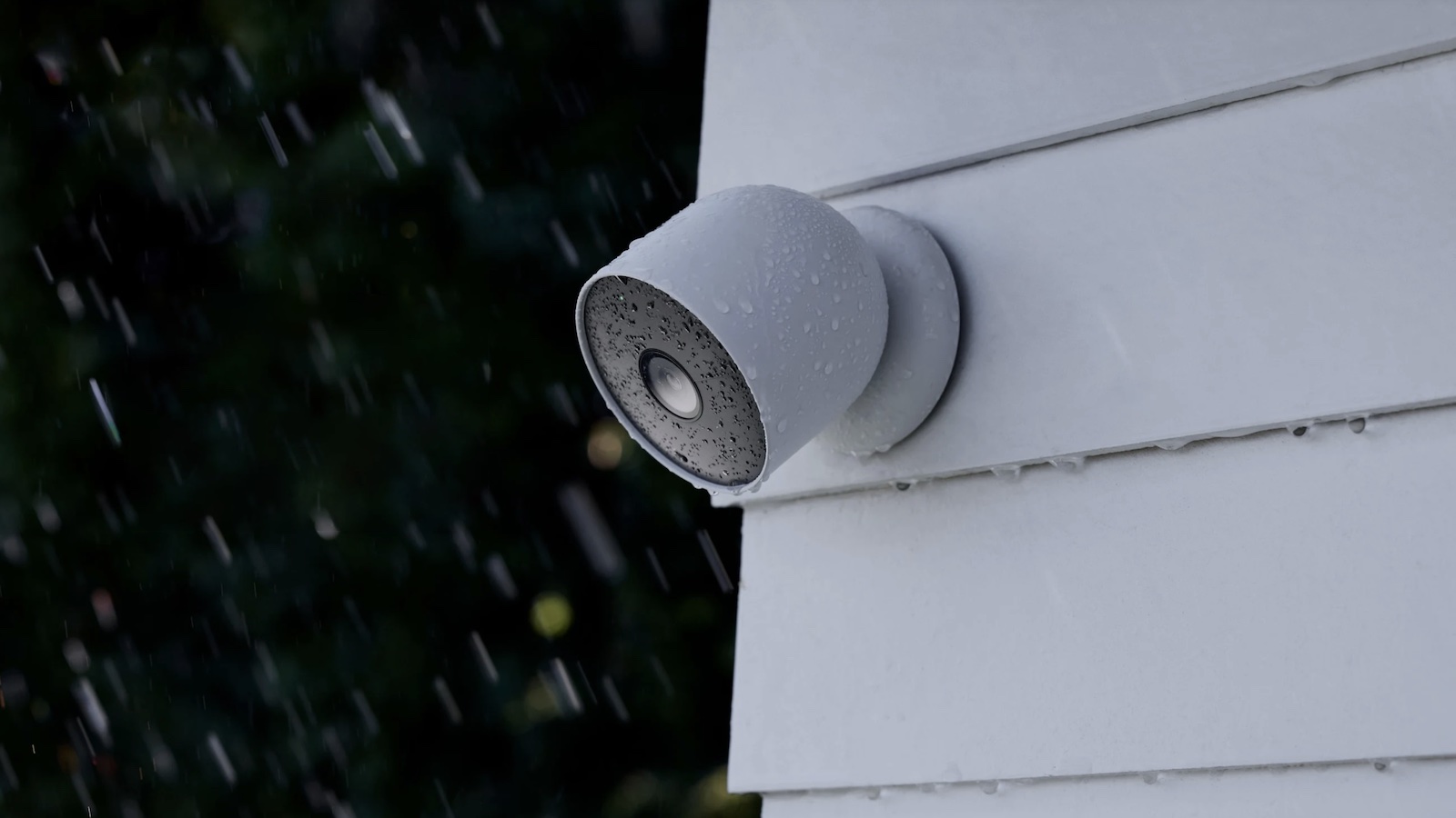 Security cam on corner of building monitor while rain is falling.